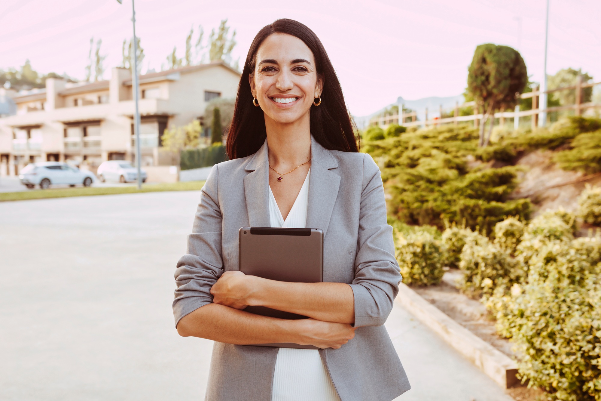 Woman manager holding digital tablet outdoors